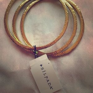 Beautiful hammered gold tone Silpada Bracelets.